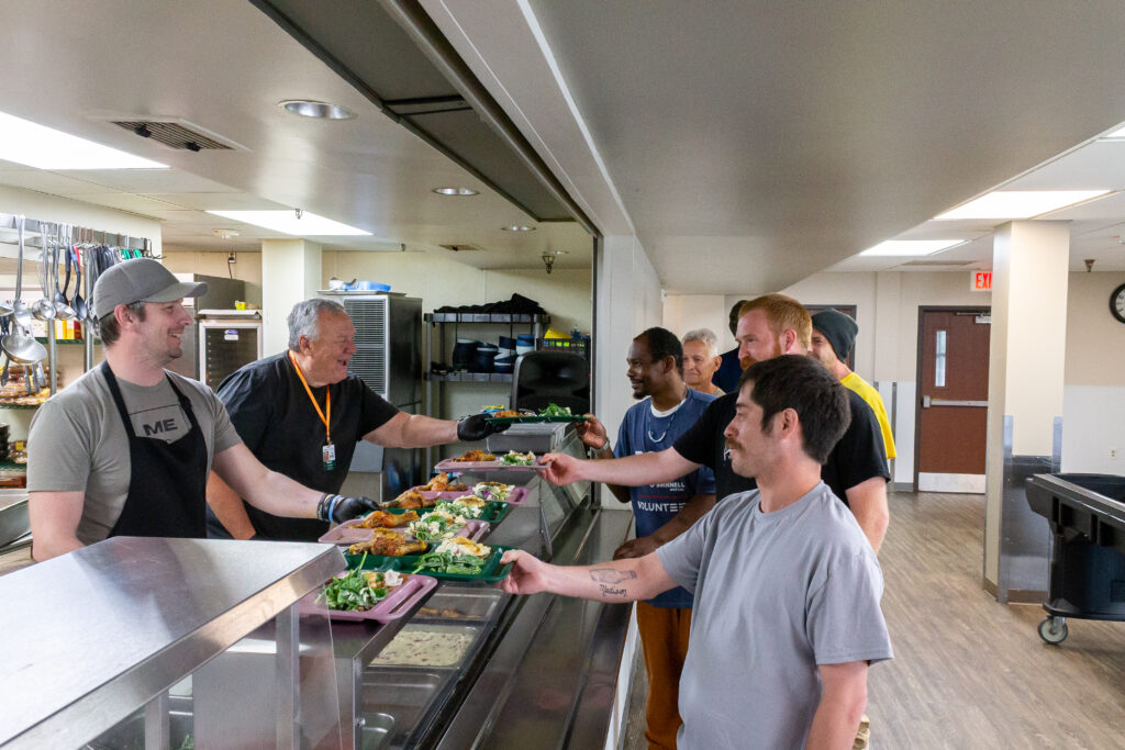 Men receiving meals at Hope Ministries Hope Cafe